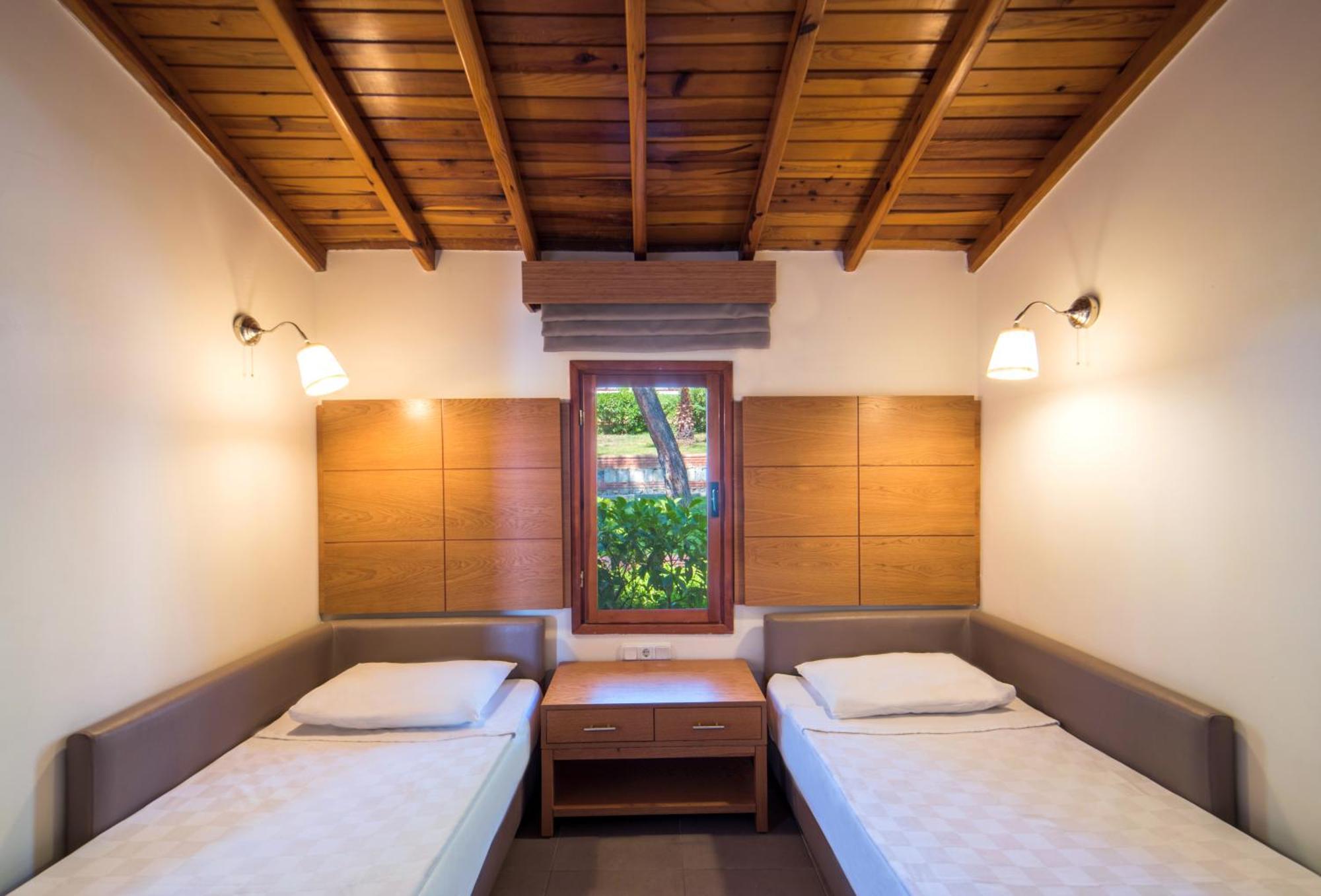 松树湾旅游度假酒店 库萨达斯 客房 照片 A room at the hotel